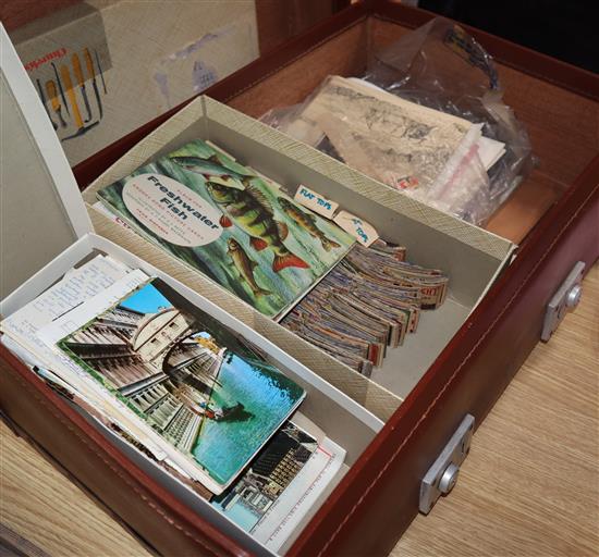 A suitcase of assorted tea cards, loose stamps, Royal ephemera etc